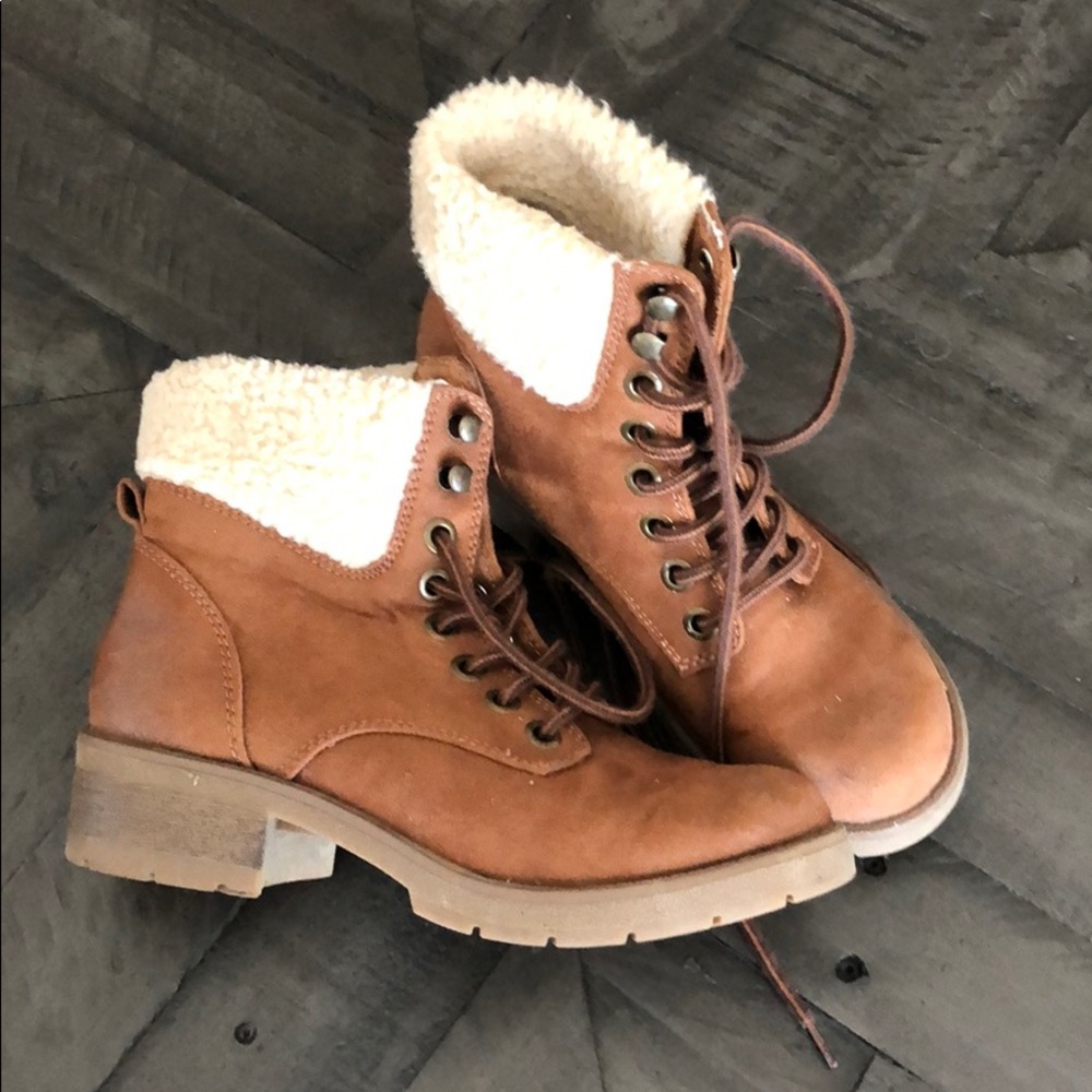 Lace up boots with fuzzy ankle tops